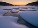 frozen-river-at-sunset